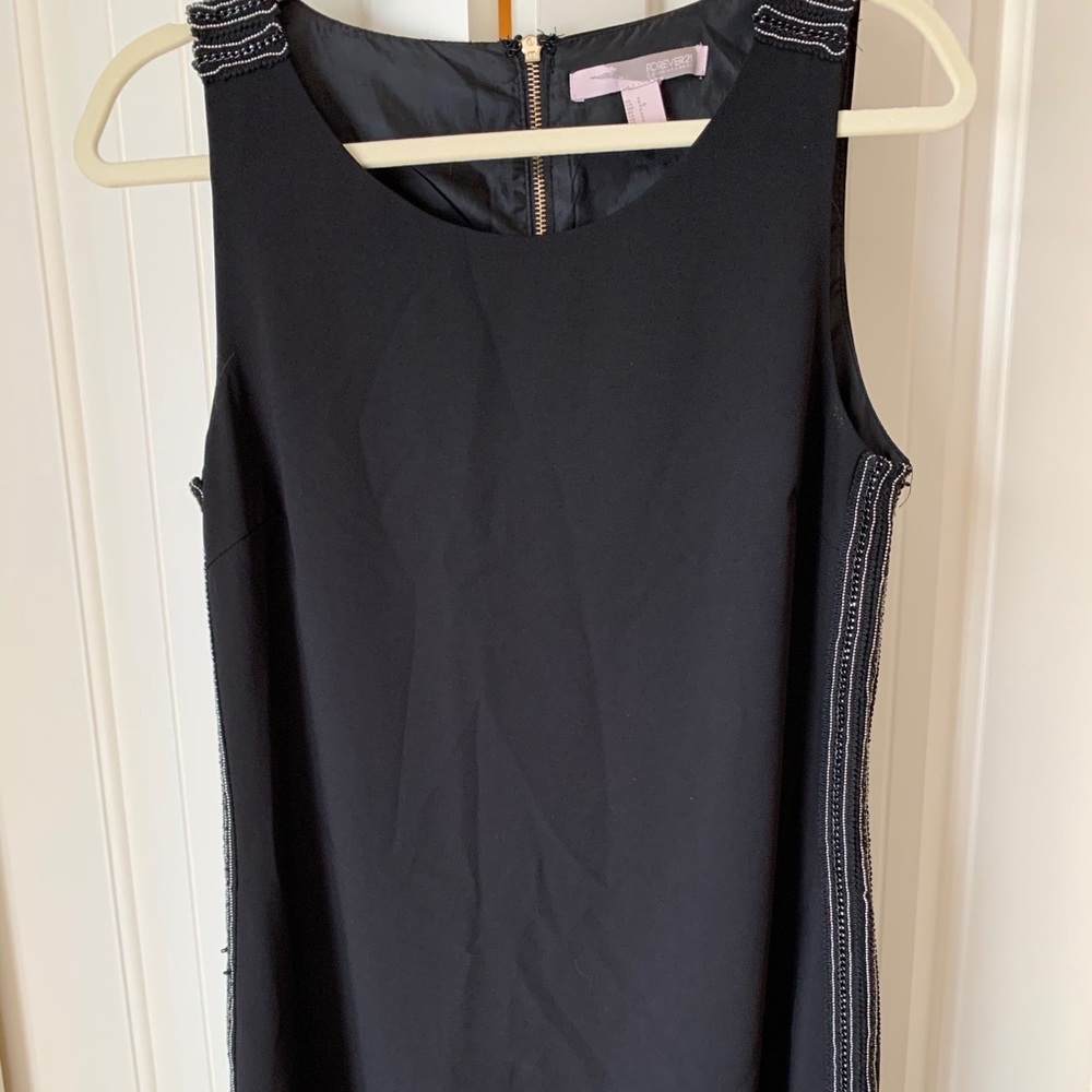 Black lightweight dress with elegant detail